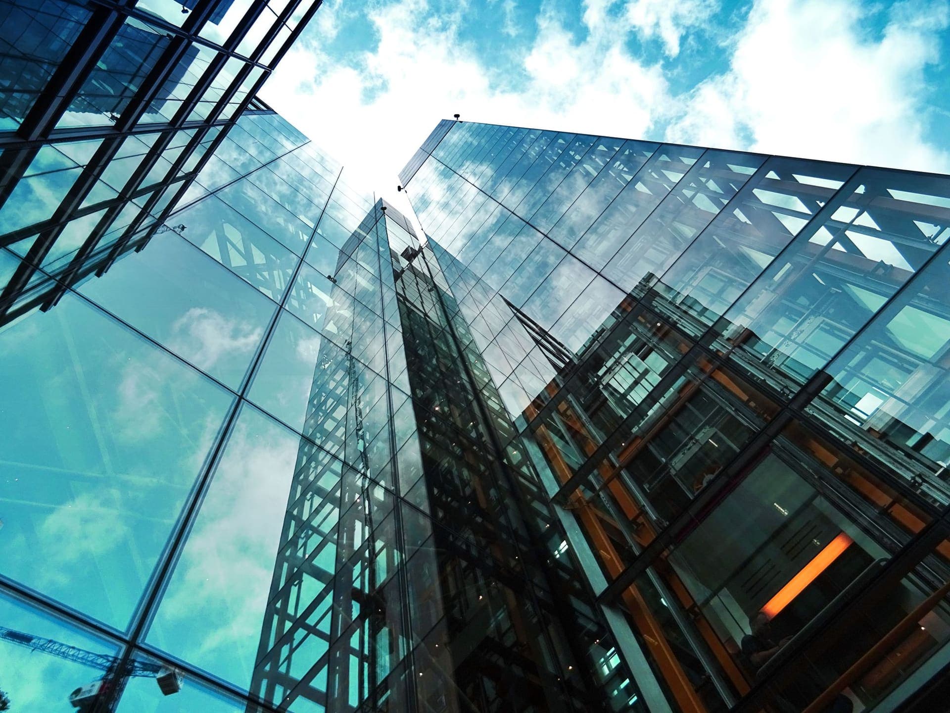 Clean reflective glass facade on a commercial high-rise building
